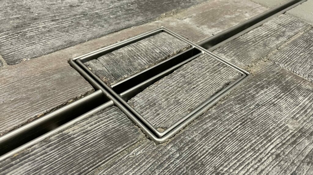 Maintain your hardscape's aesthetic while providing instant access to your strainer basket